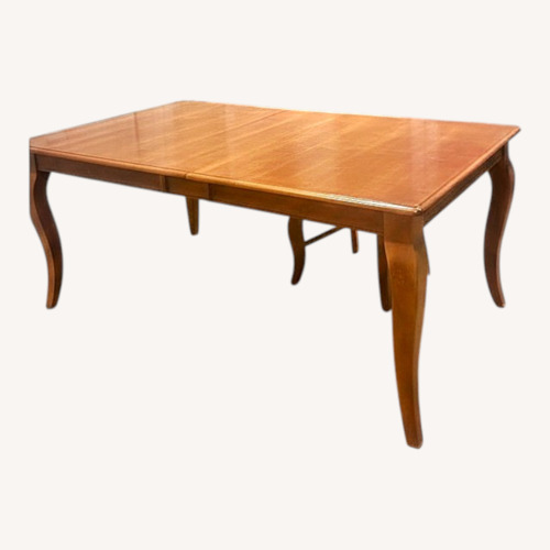 Used Bassett Good Light Brown Wood Dining Table for sale on AptDeco