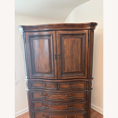 Used Casa Cristina 2 Door, 3 Drawer Wood Armoire for sale on AptDeco