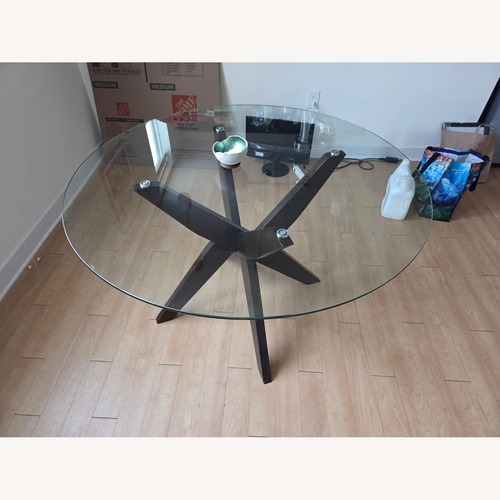 Used Tempered Glass Dining Table for sale on AptDeco