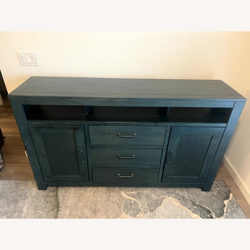 Used Rooms To Go Abbey Springs Blue Console for sale on AptDeco