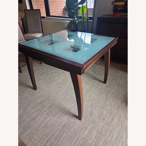 Used Calligaris Dark Brown Glass Dining Table for sale on AptDeco