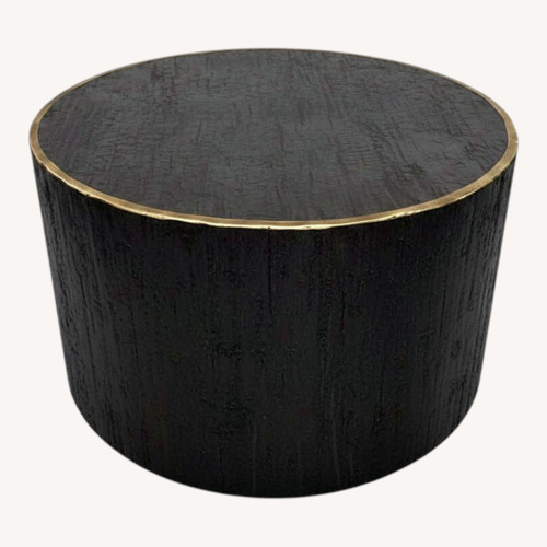 Used Tundra Round Steel Coffee Table for sale on AptDeco