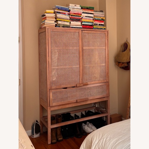 Used Urban Outfitters Marte Rattan Natural Wood Armoire for sale on AptDeco