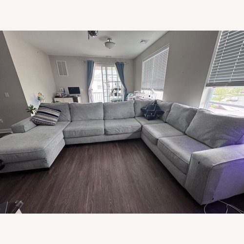 Used Raymour & Flanigan Light Gray 3+ Piece Sectional for sale on AptDeco