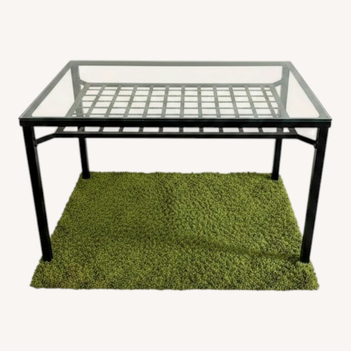Used Modern Glass Dining Table with Metal Frame for sale on AptDeco