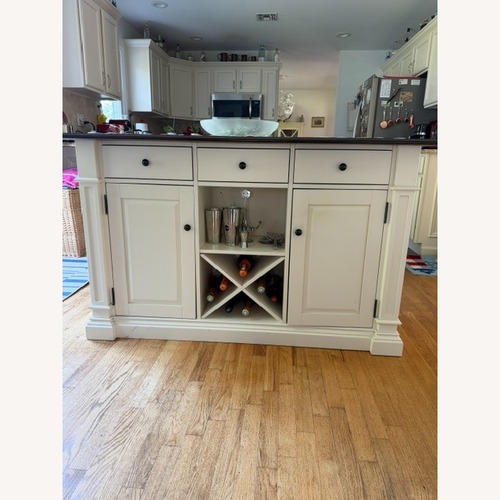 Used Raymour & Flanigan Pemberton White Wood Kitchen Island for sale on AptDeco