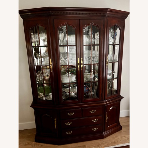 Used Huffman Koos Cherry Wood China Cabinet for sale on AptDeco
