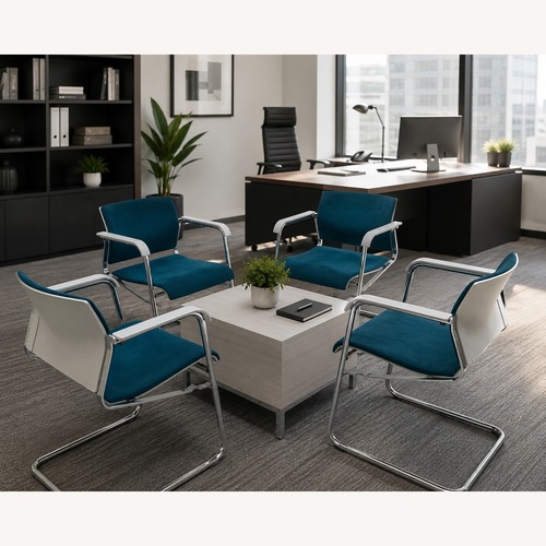 Used 4 Wilkhahn Teal Armchairs & Center Table for sale on AptDeco