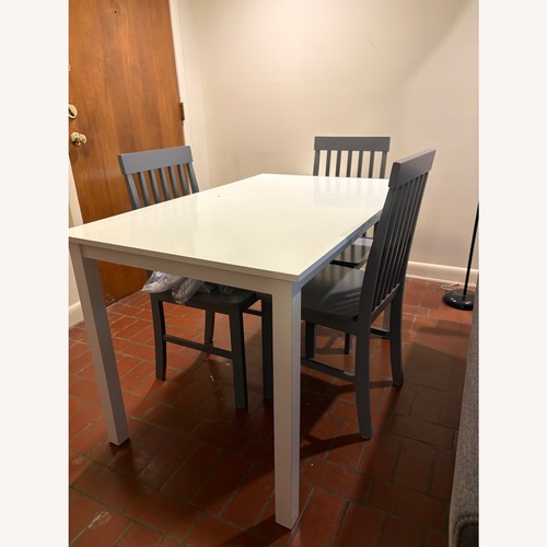 Used Table and 3 Chairs  for sale on AptDeco