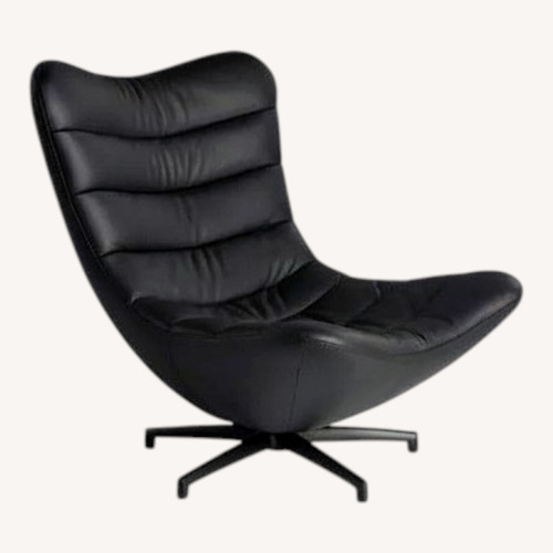 Used Roche Bobois Black Leather Armchair With Ottoman for sale on AptDeco