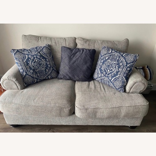 Used Ashley Furniture Light Gray Fabric Loveseat for sale on AptDeco