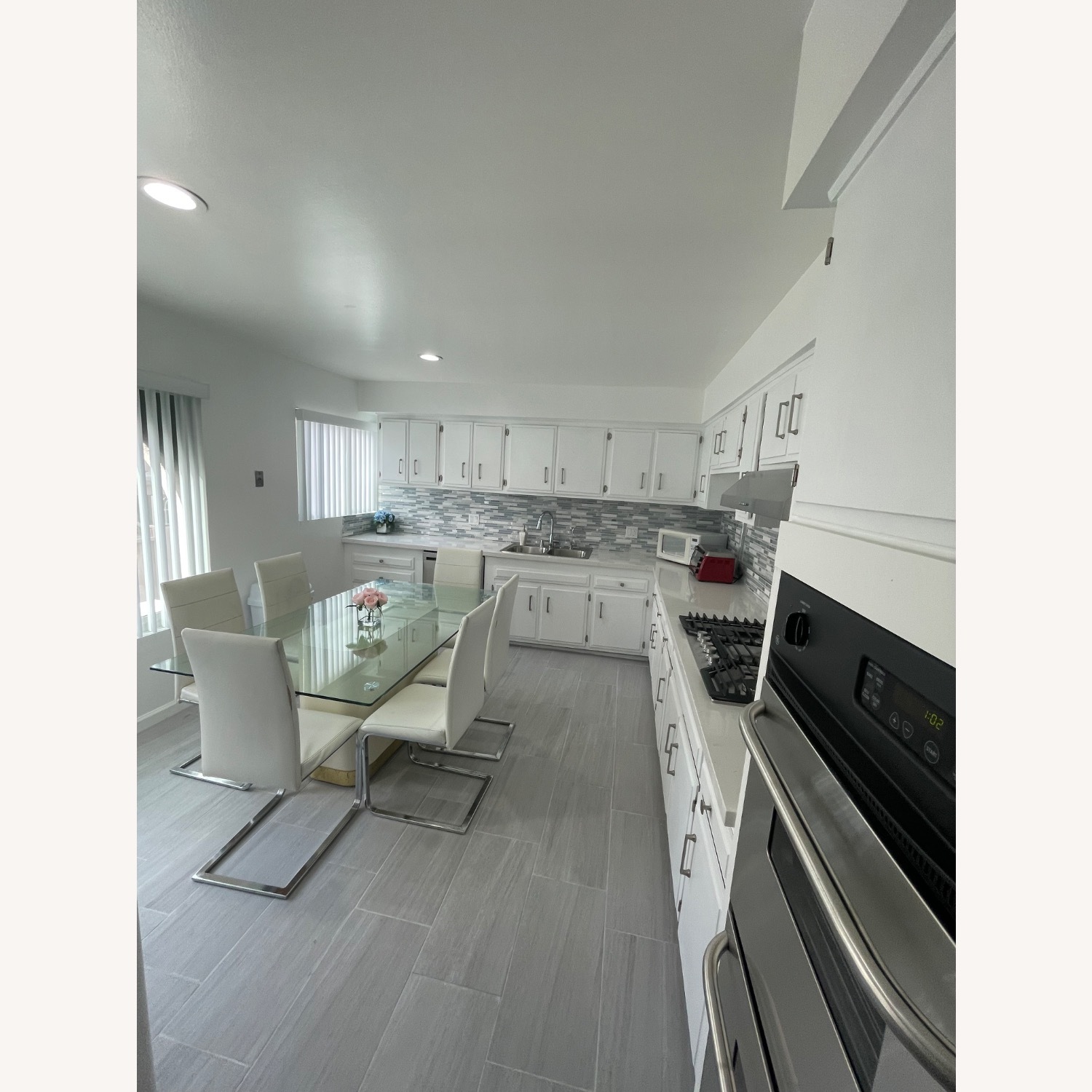 White Leather Dining Chairs & Glass Table - image-3
