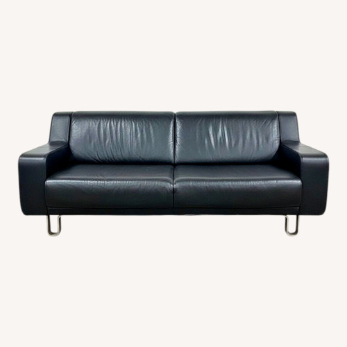 Used Modern Leather w/ Sculptural Metal Base Sofa for sale on AptDeco