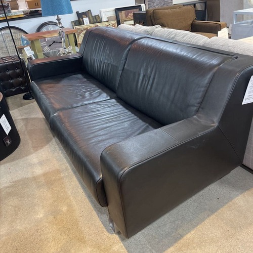 Used Modern Leather w/ Sculptural Metal Base Sofa for sale on AptDeco