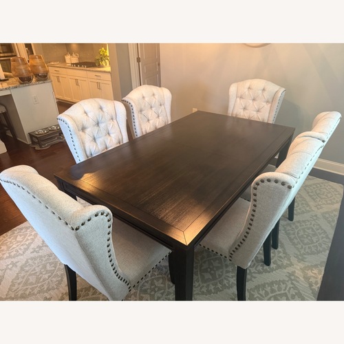 Used Ashley Furniture Dark Brown Wood Dining Sets for sale on AptDeco