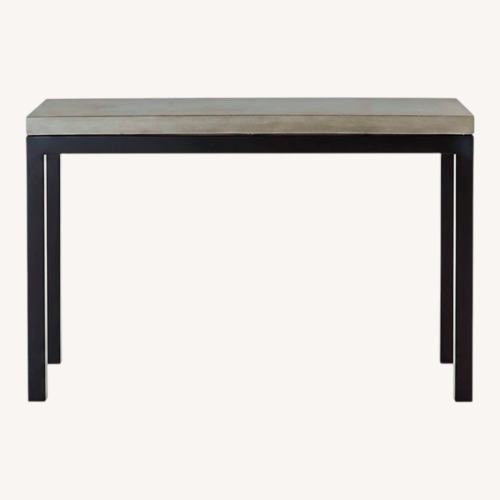 Used Crate & Barrel Gold Concrete Dining Table for sale on AptDeco