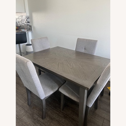 Used 4 Chair Wodden Dining Table  for sale on AptDeco