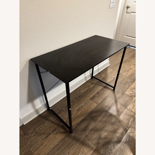 Used Amazon Black Wood Desk for sale on AptDeco