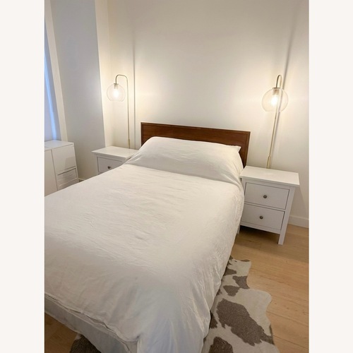 Used Hermes Dark Brown Wood Full Bed for sale on AptDeco