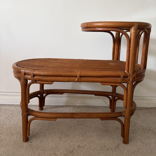 Used Vintage Rattan Gossip Bench with Glass Top for sale on AptDeco
