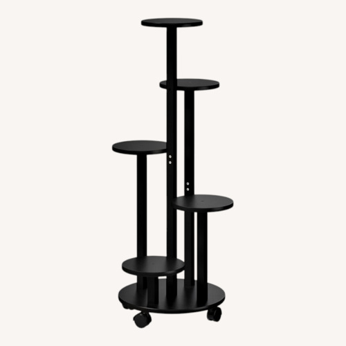 Used Black Plant Stand with Wheels for sale on AptDeco