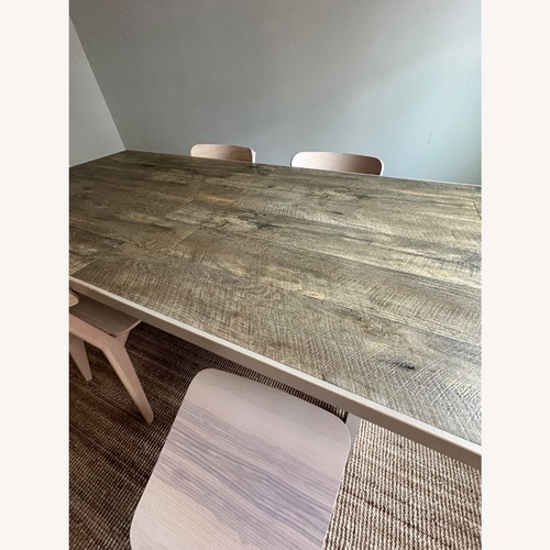Used Crate & Barrel Cucina Pinot Grigio Natural Wood Dining Table for sale on AptDeco