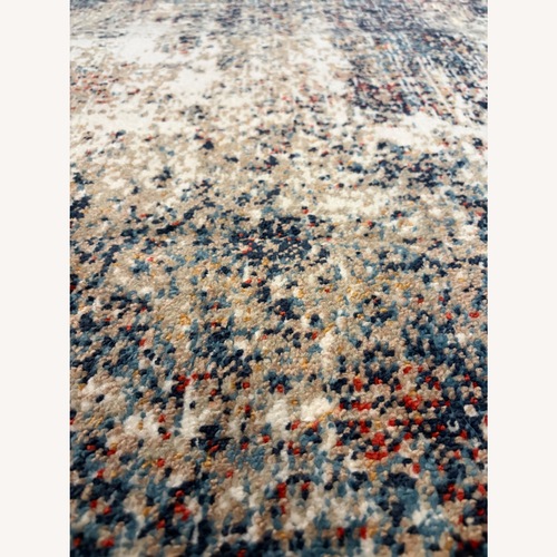 Used Ashley Furniture Area Rug for sale on AptDeco