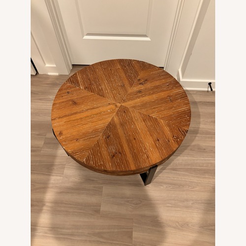Used Target ModernLuxe Round Coffee Table W Black Metal Base  for sale on AptDeco