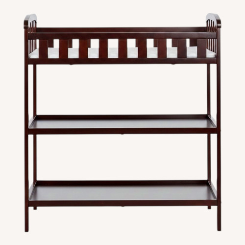 Used Dark Brown Wood Changing Table for sale on AptDeco