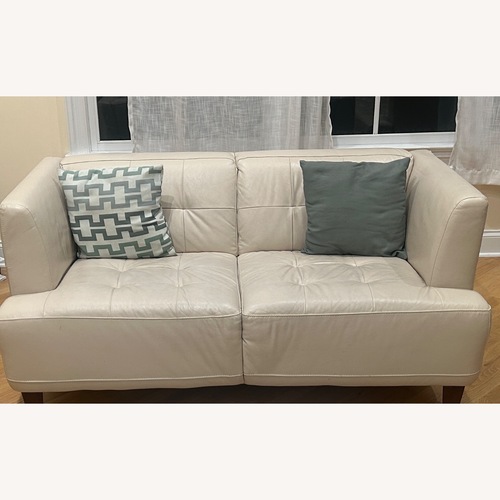Used Macy's Alessia Ivory Leather Loveseat for sale on AptDeco