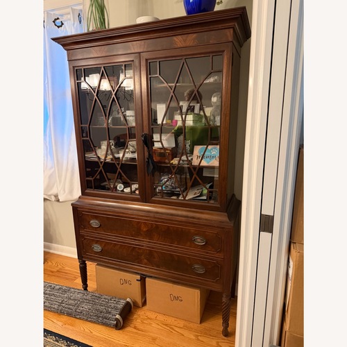 Used Vintage/Antique Dark Brown Wood Sideboard for sale on AptDeco