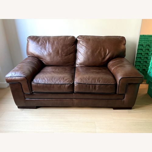 Used Raymour & Flanigan Colton Brown Genuine Leather Loveseat for sale on AptDeco