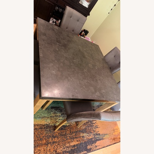 Used Raymour & Flanigan Dark Gray Dining Table for sale on AptDeco