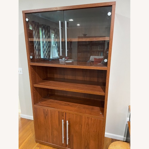 Used Wall Unit With Glass Doors for sale on AptDeco