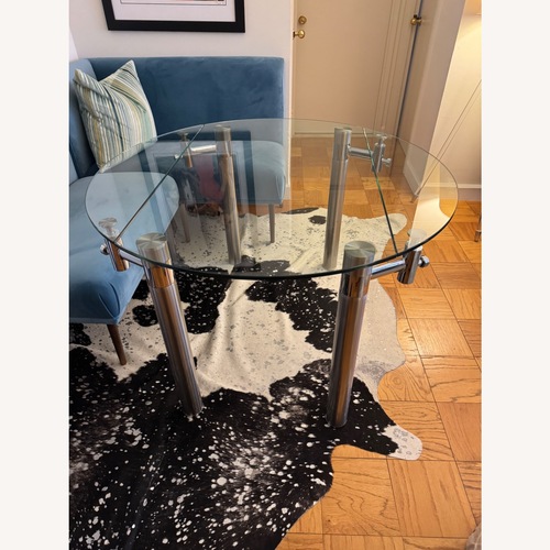 Used Macy's Expandable Glass Dining Table for sale on AptDeco