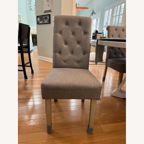 Used Trisha Yearwood Home Collection Table & Chairs for sale on AptDeco