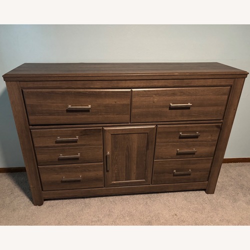 Used Ashley Furniture Juararo Light Brown Dresser for sale on AptDeco