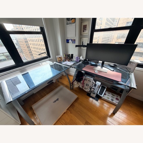 Used Office Depot L-Shaped Glass Top Desk for sale on AptDeco