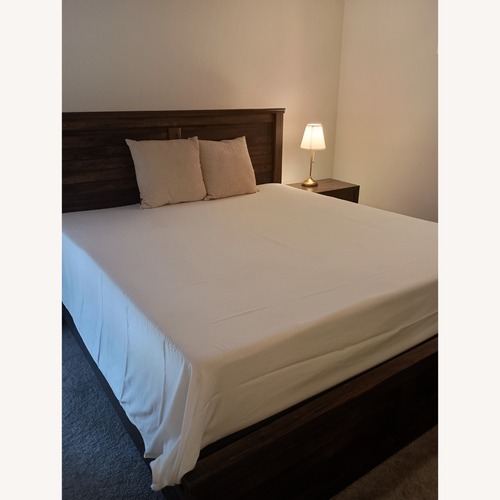 Used Turner's Furniture Dark Brown Wood King Bed  for sale on AptDeco