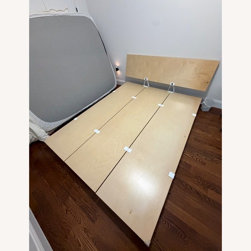 Used Floyd Natural Wood Queen Bed for sale on AptDeco