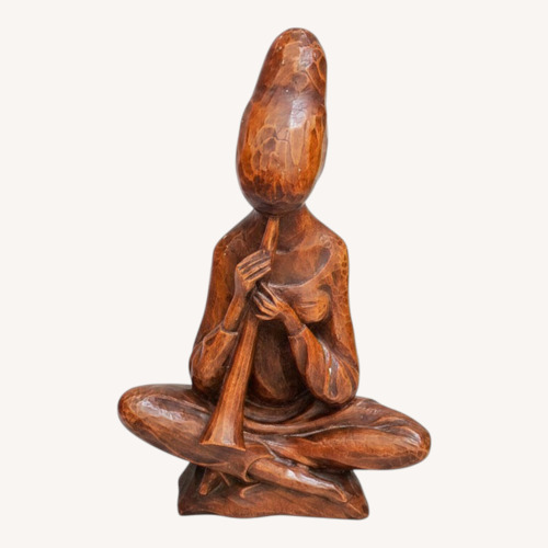 Used Hand Crafted Figure Playing Flute for sale on AptDeco