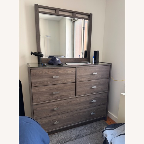 Used Dark Brown Wood Dresser for sale on AptDeco