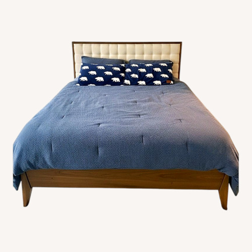 Used Dark Brown Wood Queen Bed for sale on AptDeco