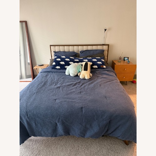 Used Dark Brown Wood Queen Bed for sale on AptDeco