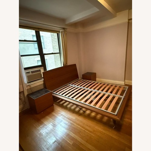 Used Calligaris Dark Brown Wood Queen Bed for sale on AptDeco