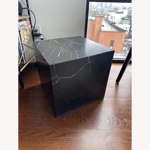 Used Herman Miller Plinth Black Marble Side Table for sale on AptDeco