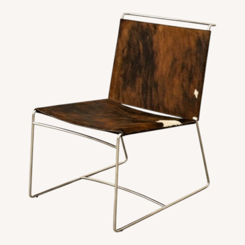 Used Ligne Roset Hair on Hide Lounge Chair for sale on AptDeco