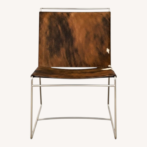 Used Ligne Roset Hair on Hide Lounge Chair for sale on AptDeco