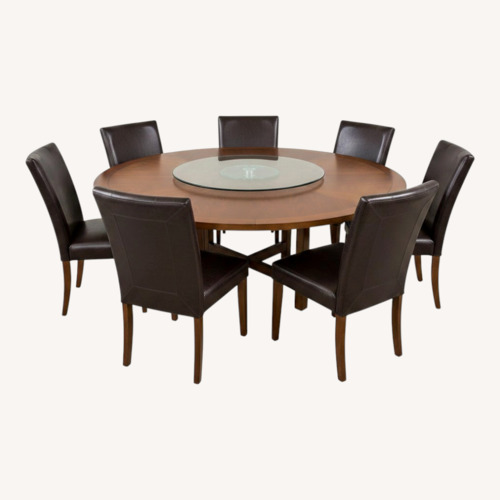 Used Round Dining Set With Leather Chairs for sale on AptDeco