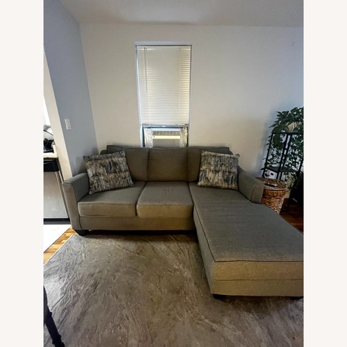 Used Raymour & Flanigan Wrenn Light Gray 2 Piece Sectional for sale on AptDeco